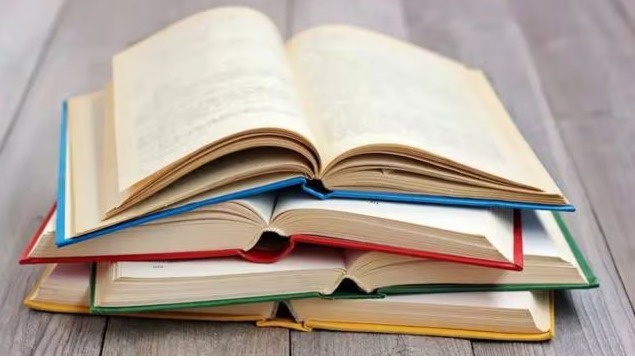 "NCERT textbook with Tipu Sultan portrait crossed out – Symbolizing removal from curriculum"